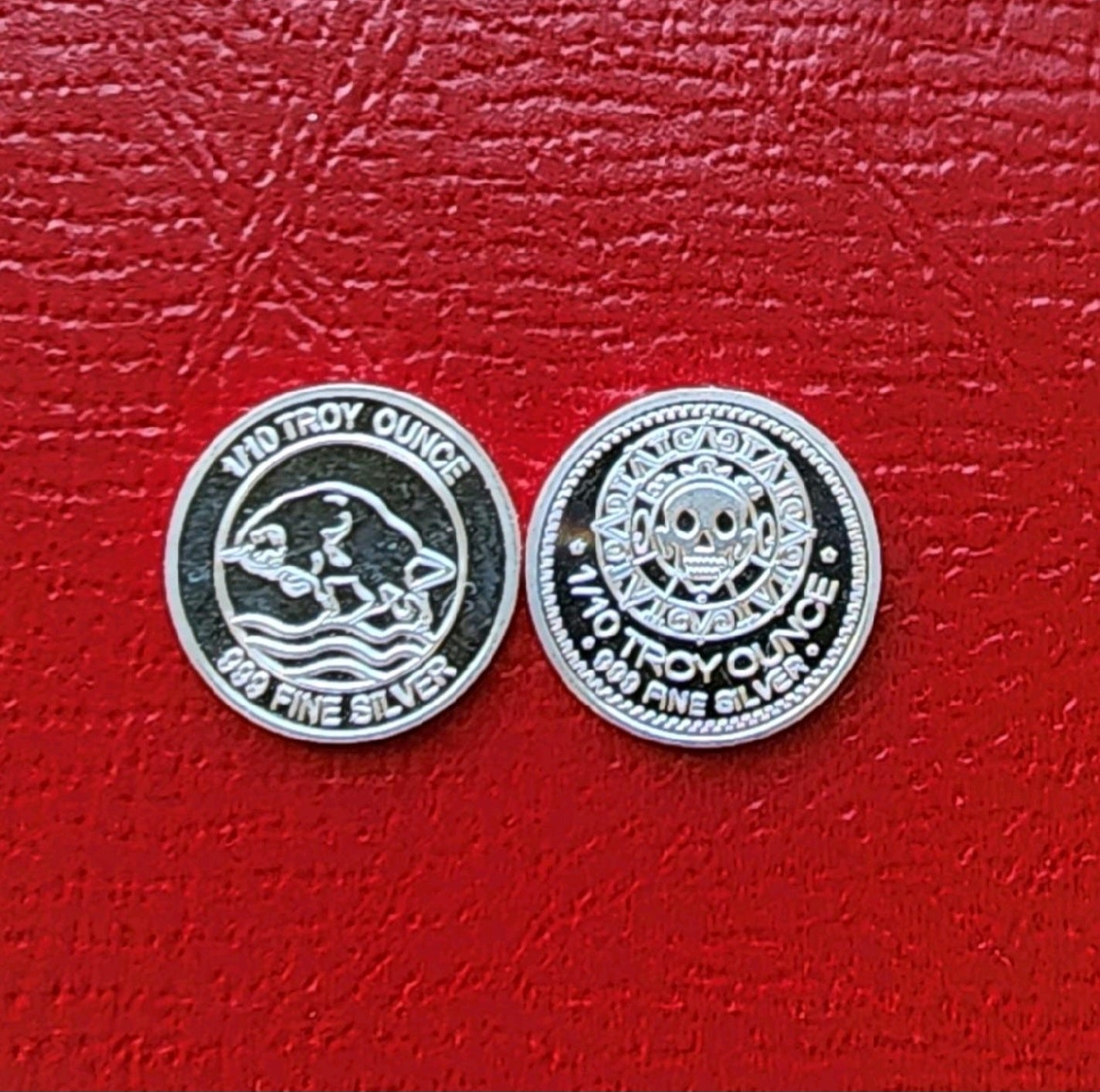 One Tenth  Troy Oz.  .999 Silver Round - Bull & Skull